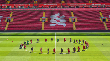 Liverpool players take a knee in memory of George Floyd © Liverpool FC via Getty Images