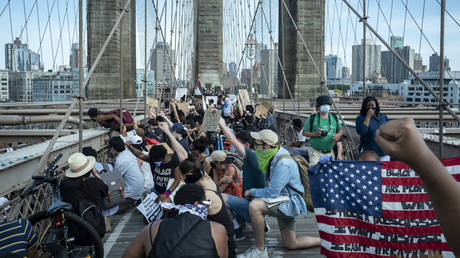 Protesters take a knee in support of the family and friends of George Floyd, Manhattan Borough of New York on June 04, 2020, USA
