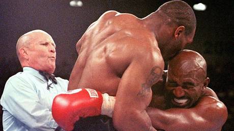 Mike Tyson bites Evander Holyfield; JEFF HAYNES / AFP