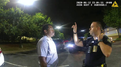 Former Atlanta Police Department officer Garrett Rolfe conducts a field sobriety test on 27yo Rayshard Brooks © Atlanta Police Department / handout via Reuters
