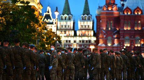 Military personnel on Tverskaya street during training of military equipment crews before the rehearsal of the parade on Red Square © Sputnik / Ramil Sitdikov