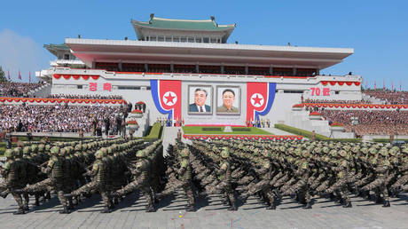 FILE PHOTO: North Korean soldiers march during a military parade marking the 70th anniversary of the country's foundation in Pyongyang.