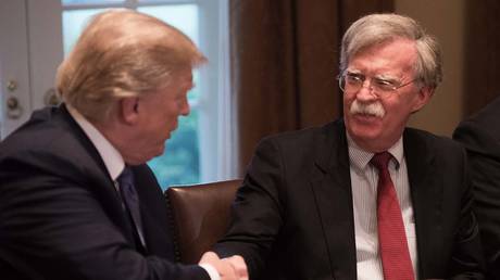 John Bolton and Donald Trump © AFP / Nicholas Kamm