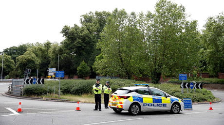 A police cordon outside Forbury Gardens following a stabbing attack in Reading, Britain. June 21, 2020. © Matthew Childs / Reuters