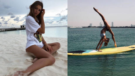 'Summer in full swing': Gymnastics queen Soldatova shows off spellbinding suppleness while riding PADDLEBOARD (PHOTOS)