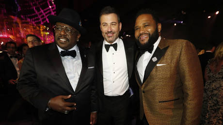 Kimmel, taking care to be photographed with as many black people as possible? © Reuters / Mario Anzuoni