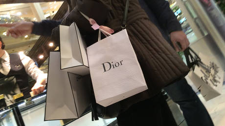 FILE PHOTO: Dior shopping bags in a department store in Paris, France © Reuters / Mal Langsdon