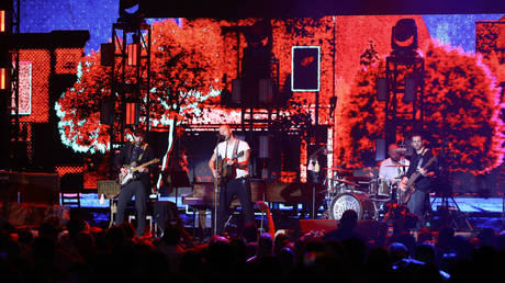 Jonny Buckland, Chris Martin, Will Champion, and Guy Berryman of Coldplay perform onstage at the 2020 iHeartRadio ALTer EGO at The Forum on January 18, 2020 in Inglewood, California
