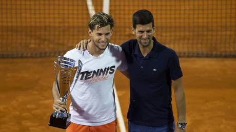 Dominic Thiem and Novak Djokovic. © MB Media / Getty Images