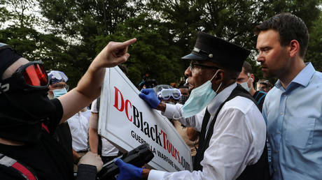 Protesters tell journalist Jack Posobiec to get out of the Lincoln Park in Washington, DC, US, June 26, 2020