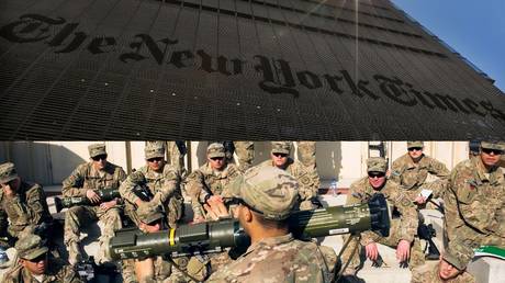 The New York Times Building in New York © REUTERS/Brendan McDermid/ US soldiers listen to a briefing at forward operating base Gamberi in Afghanistan © REUTERS/Lucas Jackson