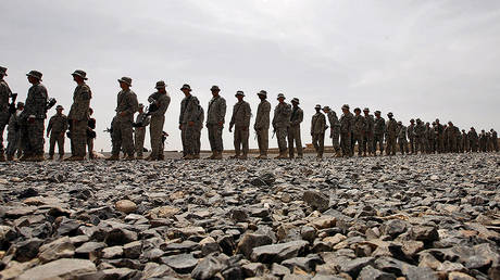 FILE PHOTO U.S. forces are seen Asad Khil village near the site of a U.S. bombing in the Achin district of Jalalabad, east of Kabul, Afghanistan © AFP / POOL / JASON REED