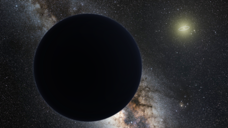 Planet Nine eclipsing the central Milky Way, with the Sun in the distance, artist's impression. © Wikipedia