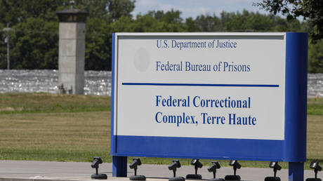 The entrance to the federal prison in Terre Haute, Ind., is shown Monday, July 13, 2020. © AP Photo/Michael Conroy