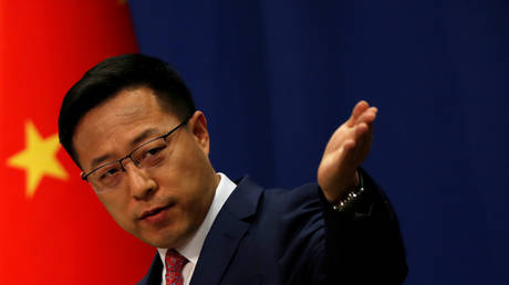 FILE PHOTO: Chinese Foreign Ministry spokesman Zhao Lijian attends a news conference in Beijing, China.