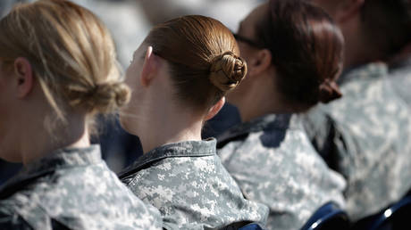 Soldiers, officers and civilian employees attend the commencement ceremony for the U.S. Army's annual observance of Sexual Assault Awareness and Prevention Month in the Pentagon Center Courtyard March 31, 2015 in Arlington, Virginia