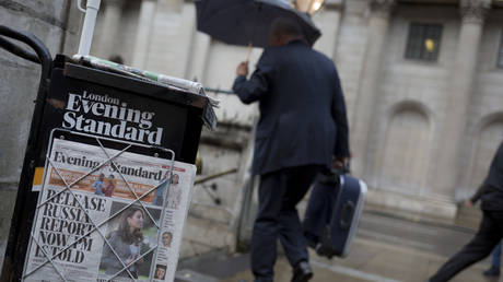 FILE PHOTO: Copies of the London Evening Standard newspaper lead with a headline about government ministers' controversial decision to hold back until after the current general election on 12th November 2019, in the City of London, England