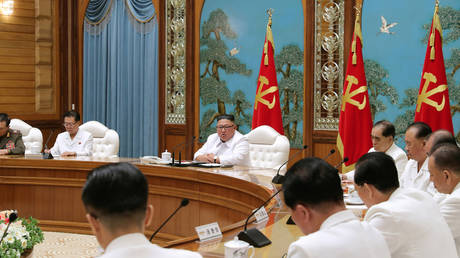 North Korean leader Kim Jong-un holds an emergency enlarged meeting of Political Bureau in Pyongyang, July 25, 2020