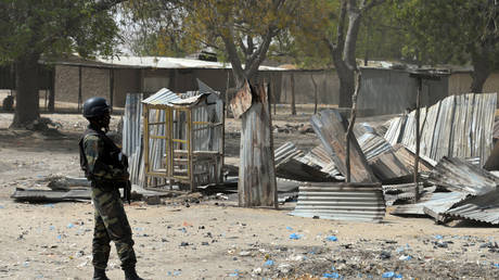 FILE PHOTO: A picture taken on February 17, 2015 shows a Cameroonian soldier walking in the Cameroonian town of Fotokol