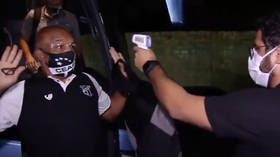 Freeze! Put your hands up! Brazilian football team member frightened by electronic thermometer (VIDEO)