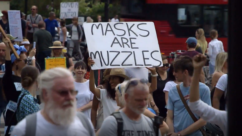 'Masks are muzzles': Protesters rally outside BBC HQ & march to Downing Street after UK govt widens mask-wearing orders