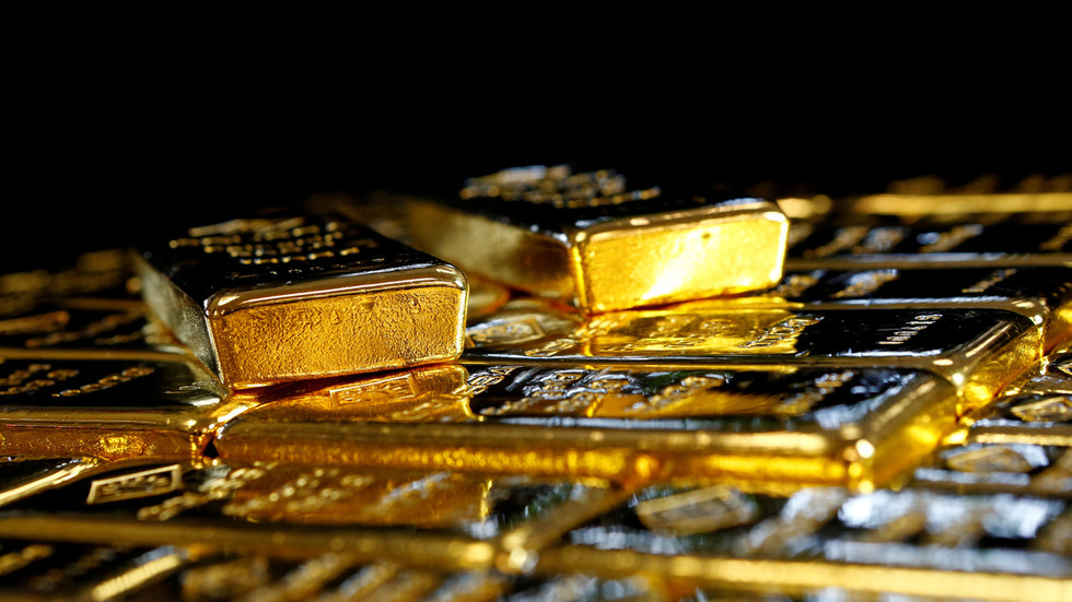 Death of DOLLAR good for GOLD: Bullion pushes past $2,000/oz as greenback dips