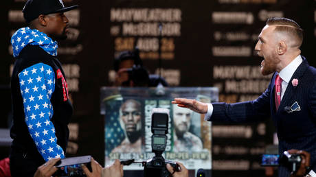 Floyd Mayweather (left) and Conor McGregor squared off in 2017 © Lucy Nicholson / Reuters