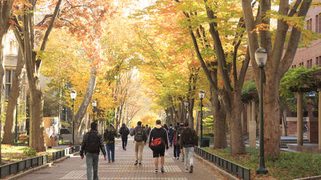 Locust Walk with students in fall, University of Pennsylvania, University City area, Philadelphia, PA, USA