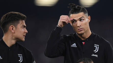 Paulo Dybala and Juventus teammate Cristiano Ronaldo. © Reuters