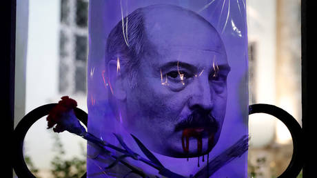 Placard depicting Belarusian President Alexander Lukashenko outside the Belarusian in Moscow, Russia August 12, 2020