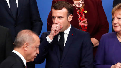 President Emmanuel Macron of France and President Recep Tayyip Erdogan of Turkey attend the NATO summit in Britain (December 4, 2019 file photo)