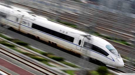 A China Railway High-speed bullet train runs towards Beijing South Railway Station