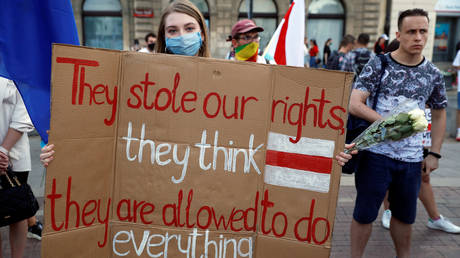 A march in support of Belarusian opposition in Warsaw, Poland, August 14, 2020.