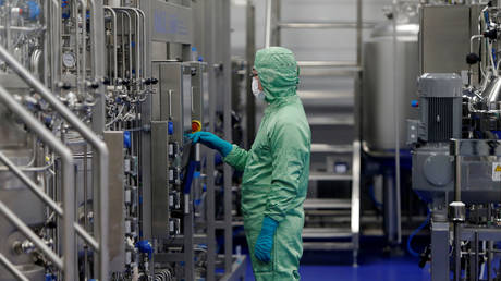 FILE PHOTO: A technician at Chinese vaccine maker CanSino Biologics in Tianjin, China November 20, 2018.