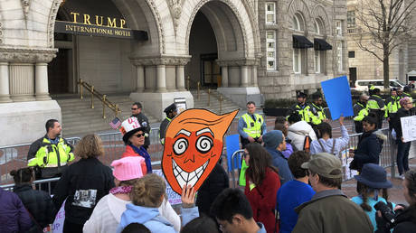 FILE PHOTO: Anti-Gun protesters outside Trump International Hotel in Washington DC, March 24, 2018