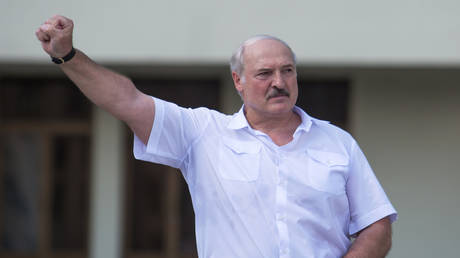 Belarusian President Alexander Lukashenko gestures during a rally of his supporters near the Government House in Independence Square in Minsk, Belarus August 16, 2020
