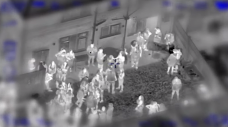 An aerial shot shows the police raid in progress, from a video released August 18, 2020 © YouTube / GM Police
