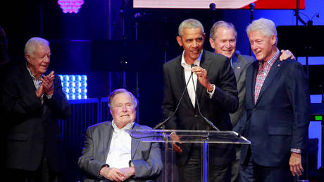 FILE PHOTO: Five former US presidents – Jimmy Carter, George H.W. Bush, Barack Obama, George W. Bush and Bill Clinton – speak at an event at Texas A&M University in College Station, Texas.