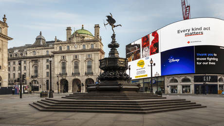 FILE PHOTO: Messages thanking everyone on the NHS frontline, care workers and those carrying out essential roles are displayed in Piccadilly Circus, deserted at 7.30am rush hour during the Coronavirus pandemic on 10th May 2020 in London, United Kingdom