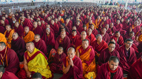 FILE PHOTO: Buddhist monks gather for the opening ceremony for a series of teachings by the Dalai Lama in Bodhgaya, India. © AFP/ January 2020. STR