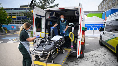 FILE PHOTO: Medics in Portsmouth, Britain. May 2020. © Reuters/Leon Neal