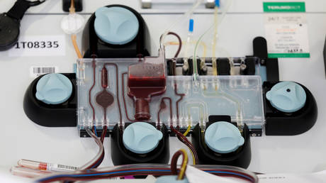 FILE PHOTO. An apheresis machine collects convalescent plasma from the whole blood of a recovered coronavirus patient in Seattle, Washington.