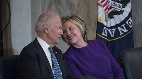 FILE PHOTO: Vice President Joe Biden and former Secretary of State Hillary Clinton attend a portrait unveiling ceremony for retiring Senate Minority Leader Harry Reid, D-Nev., in Russell Building's Kennedy Caucus Room, December 08, 2016
