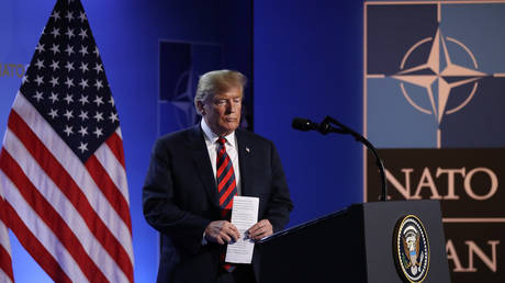 FILE PHOTO: President Donald Trump arrives to speak to the media at a press conference on the second day of the 2018 NATO Summit on July 12, 2018 in Brussels, Belgium