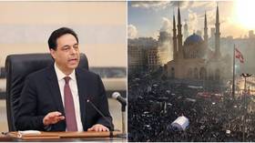 Lebanese PM calls for early parliamentary elections as protests rage following Beirut explosion