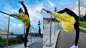 'Mixing business with pleasure': Russian gymnastics queen Aleksandra Soldatova holds impromptu street training in Moscow (PHOTOS)