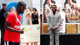 Do they look alike to you? NBC roasted for photo of actor KEVIN HART on story about athlete USAIN BOLT