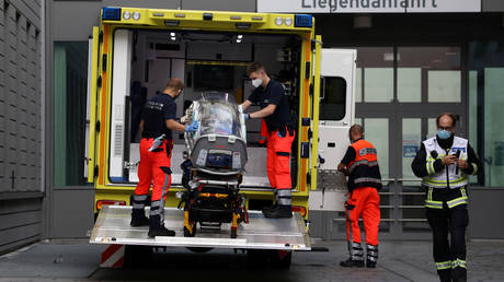 Paramedics load a stretcher into an ambulance that allegedly transported Russian opposition leader Alexey Navalny at Charite Mitte Hospital Complex in Berlin. Reuters / Christian Mang