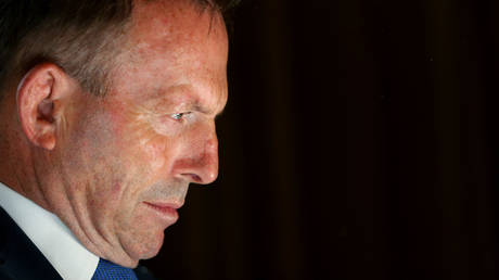 FILE PHOTO: Tony Abbott looks on as Christine Forster speaks during the launch of 'Life, Love & Marriage' by Christine Forster on June 11, 2020 in Sydney, Australia