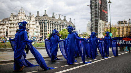 Members of the Ocean Rebellion group march during an Extinction Rebellion protest in London, Britain, September 6, 2020.